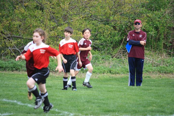 Coach in background