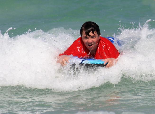 Robert catches a wave