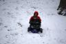 sledding at the local golf course