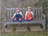 Jonathan and Robert sit on the bench