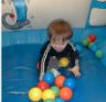 &nbsp;Jonathan in a tent with balls