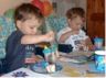Jonathan and Robert eat cake