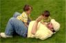 Dad, Robert and Jonathan play in the grass
