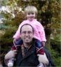 Danielle on Gary's shoulders