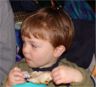 Robert holds a chicken leg