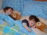 Robert, Jonathan and the teddies share a bed