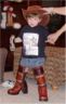 Now Robert  tries on Sheila's boots and hat