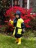 Robert eats a lollipop in the rain