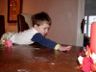 Robert reaches for a red sprinkle