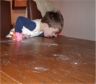 Robert licks the table
