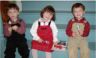 Jonathan, Chrissy and Robert eat holiday lollipops