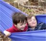 Jonathan & Robert play in a hammock