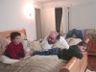 Jonathan, Robert and Ian lie in bed