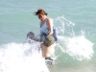 Nancy takes the boys into the waves