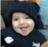 Jonathan in sweater and hat - close up