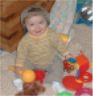 Robbie with a rattle